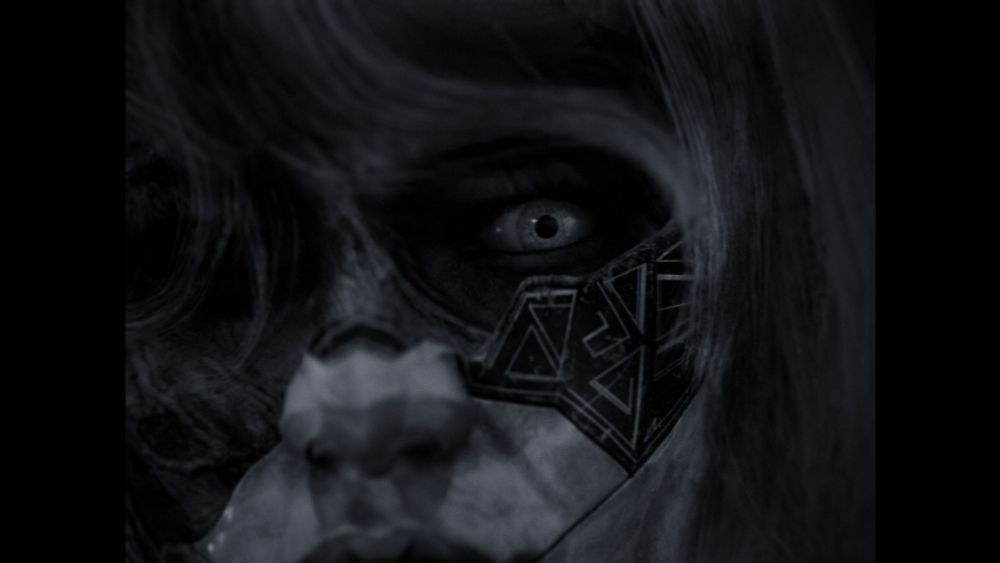 Screenshot from Clair Obscur: Expedition 33.

A black and white screen, close-up on part of a woman's very white face, with a black superhero-esque mask across the nose and around the eyes and cheeks.