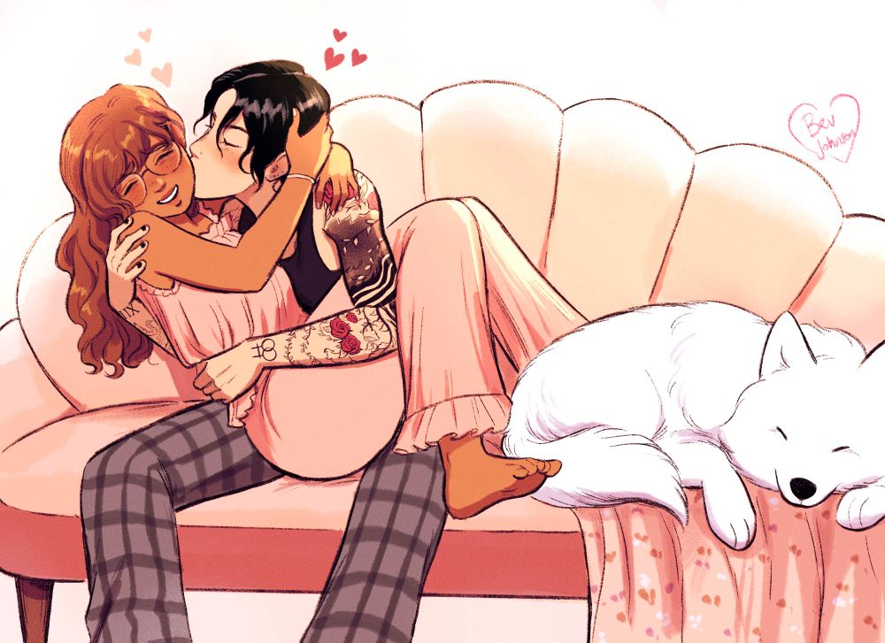 Isi and Ro cuddling on Isi’s couch with Marshmallow sleeping next to them 