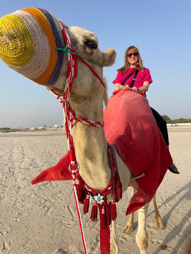 Pic of OP on a camel in desert
