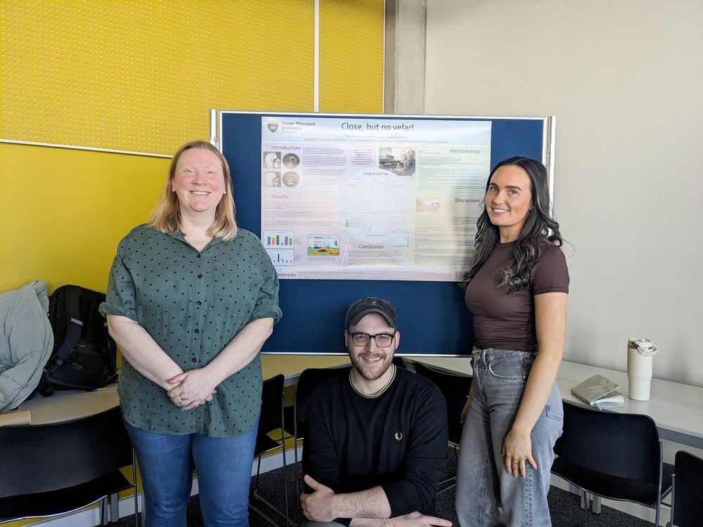 Students with research poster