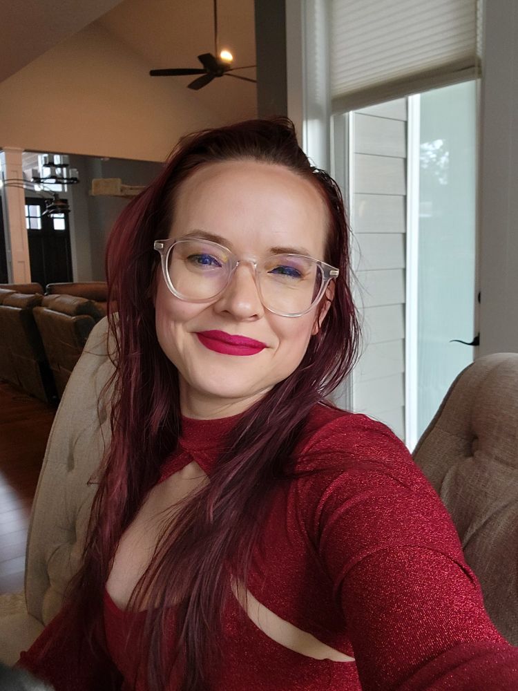 A woman wearing a red dress