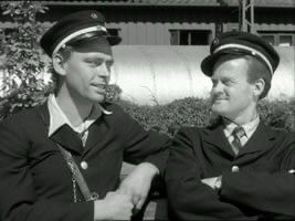 Dirch Passer and Ove Sprogøe in black-and-white in Ved Kongelunden (1953). 