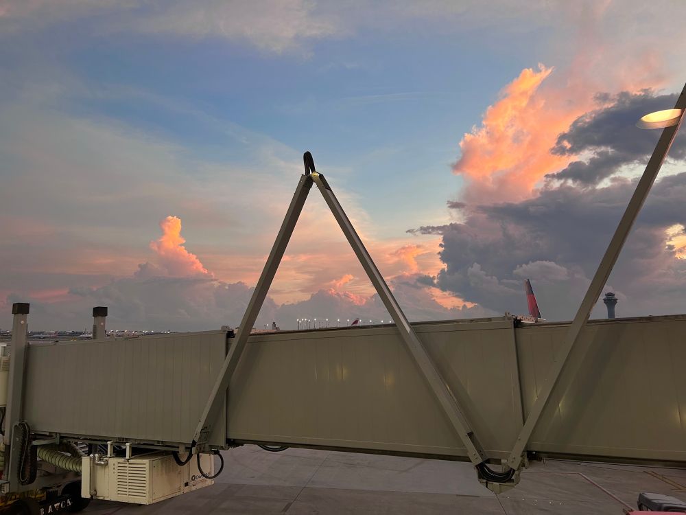 A sunset at an airport 