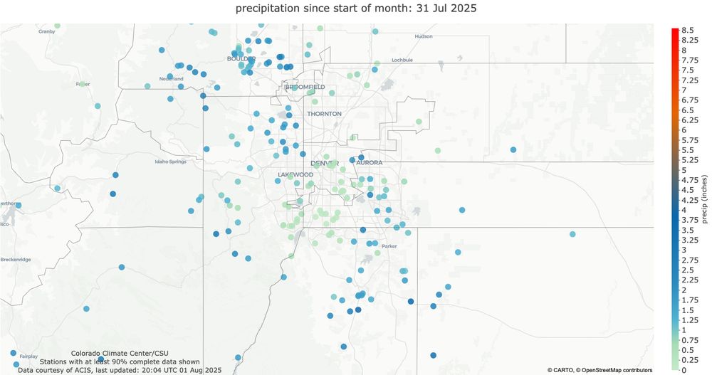 map of monthly precipitation totals zoomed in on the Denver metro area for July 2025. There are some pale greenish dots that indicate much less than 1 inch of rain, and some dark blue ones indicating 3 or more inches around the area.