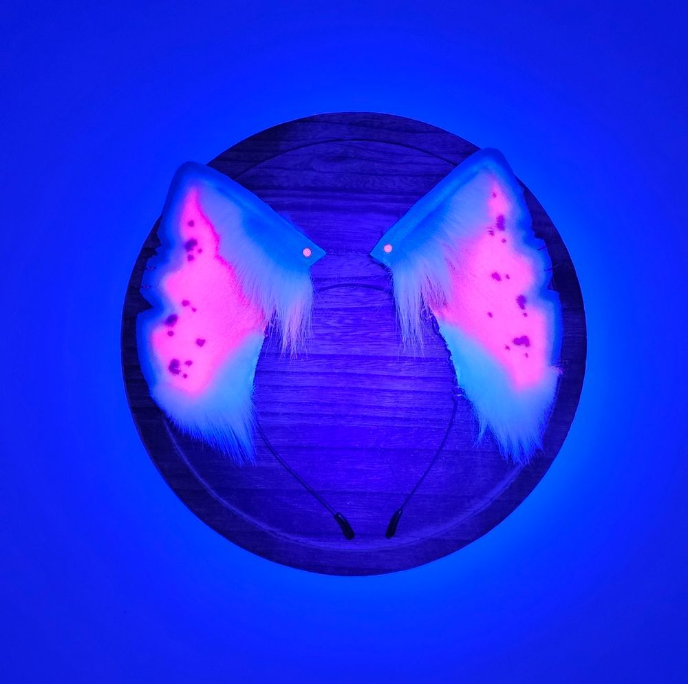 Blue & pink UV reactive faux fur hyena ears under blacklight 