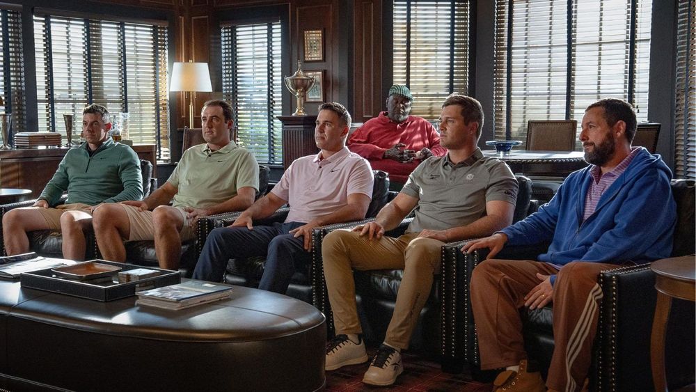Adam Sandler as Happy Gilmore sits to the right of four clones the PGA mysteriously claims were not created in a lab.