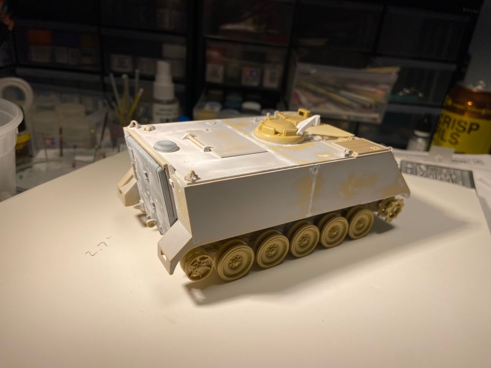 M113 scale model in its first grey primer coat. 