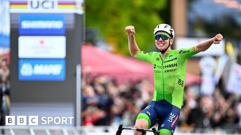 Tadej Pogacar: Slovenian wins first world road race title to complete cycling's 'Triple Crown'