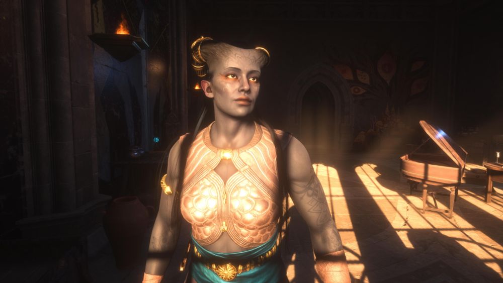 Ruya Laidir, a female Qunari warrior with dark blue skin and long dark hair. She has curled horns that sweep back and are adorned with gold rings at their base. She has purple eyes and wears gold eyeshadow around them. She has an assortment of abstract tattoos and decorative scars on her forehead and cheeks. She also has tattoos on her arms and is wearing a form fitting cream crop top and teal sash around her waist. There's a gold chain around her waist a gold bangle around her right bicep. 
