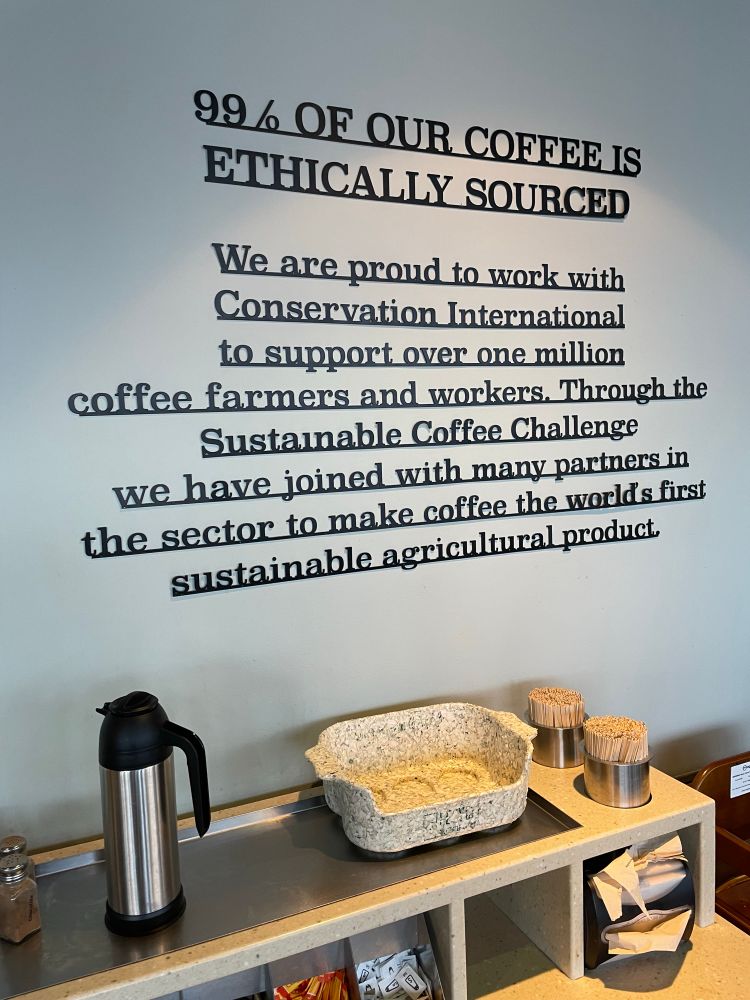 A sign which says “99% of our coffee is ethically sourced”