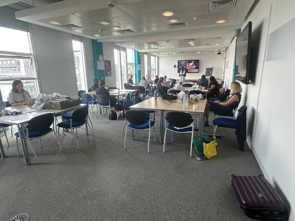 People workshopping and writing