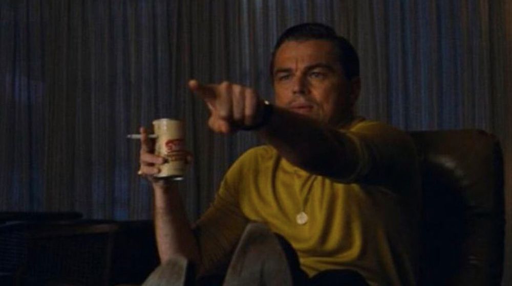 Leonardo DiCaprio's character pointing at his television