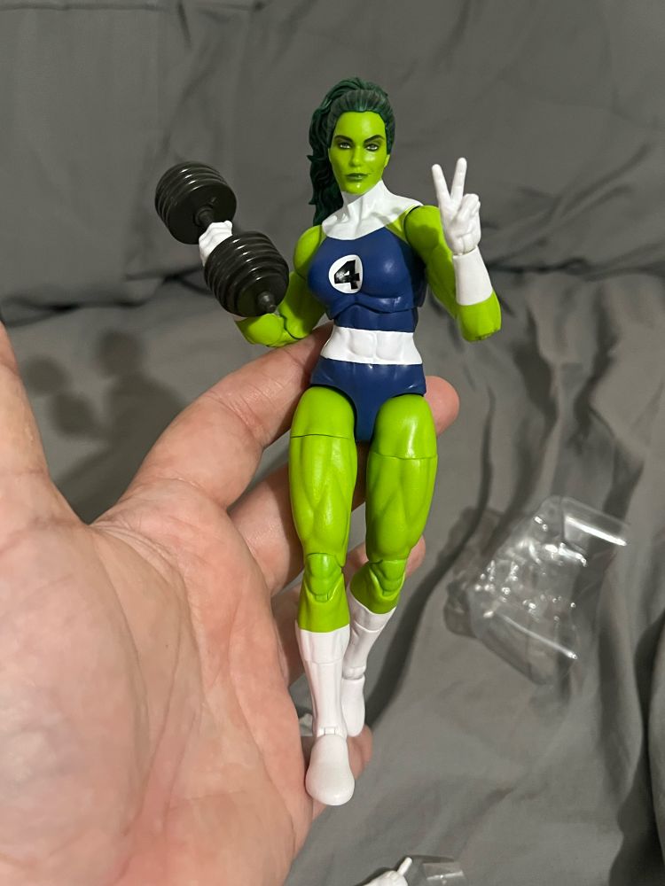 Legends She-Hulk showing some attitude while curling a dumbbell. What a great face! That green is perfect. The standard costume was a bit too light and the knees and elbows didn’t match the limbs perfectly. That happens a lot because on the pinless figures, the knees and elbows are a different plastic than the limbs. It’s nice because it’s more firm and the limbs are less bendy! But they probably take the coloring different need a bit more time to work that out at the factory. I don’t know, I’m just a David.
