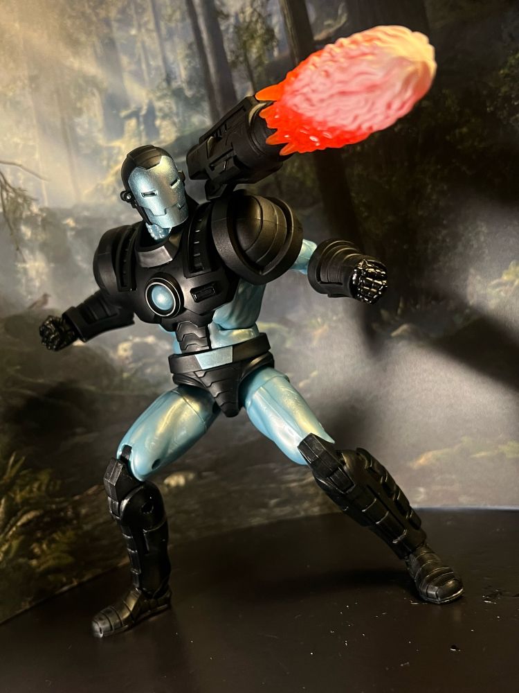 WAR MACHINE! I know we have done these thighs without pins in Iron Men.

Actually, the legs would have been best if stolen from the Modular Armor that was also already used for a War Machine that looks like the sprites of the game. This one is based on the artwork used for the cabinet and/or everywhere else and that art pretends he isn’t an Iron Man sprite recolored. But the legs still look like the sprite? They could have just made the thighs the dark gray and I would have shut up by now.

I don’t even mind, really. It’s just that this is the weakest set since neither is a superstar must-have like the other sets have. He’s got a missile that can go on a stand but no stand so I keep it in his ass. Nobody is reading this. I keep it in his ass for real. That’s my midnight confession.