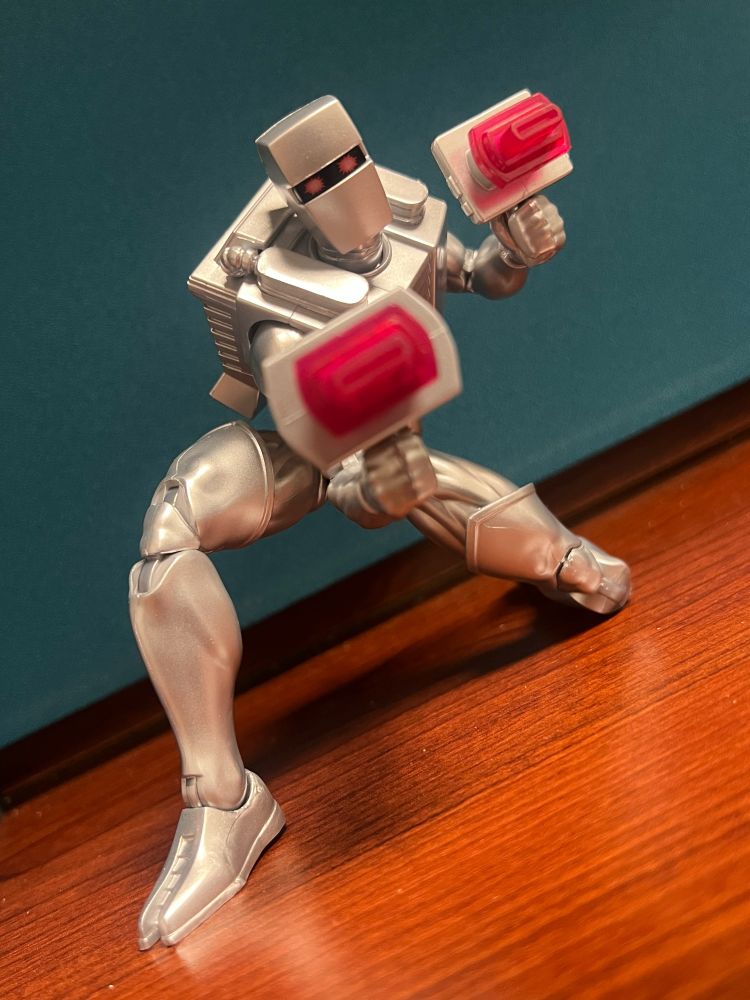 ROM: Double fisting for Jesus. Space Jesus. Not the regular kind. The space kind is probably the regular kind if you live in space. Anyway he’s got two guns. I don’t know if one is supposed to look more like the old toy or what. Hadn’t thought about it until this moment. You find out and get back to me, newsie.