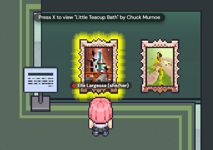A screenshot of the Gather platform showing the 8-bit view of an Art Gallery at SizeCon Micro 2025. Elle's pink-haired avatar stands on a green carpet facing two works of art on a wall, framed with gold. The art is pixelated. Text reads "Press X to view 'Little Teacup Bath' by Chuck Murnoe."
