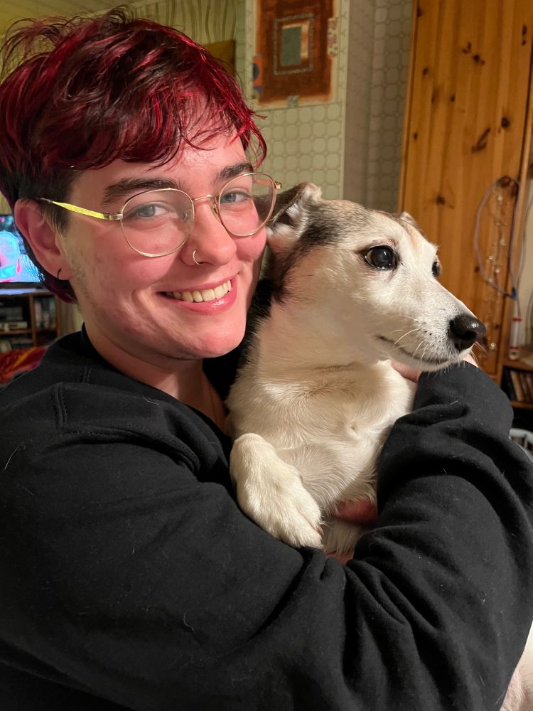 me holding milka, a jack russell terrier, in my arms