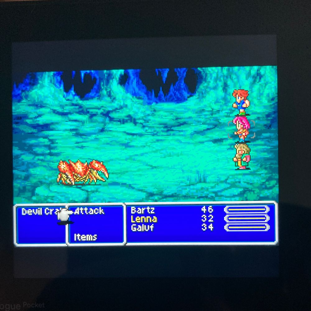 Photo of Analogue Pocket playing Final Fantasy 5 during an encounter with a Devil Crab