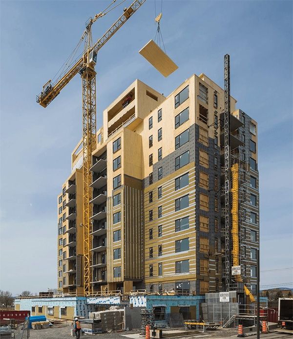 Like Ikea furniture, mass timber buildings are assembled out of prefabricated pieces. The Origine condo in Quebec City went up an estimated 25 percent faster than a conventional building.