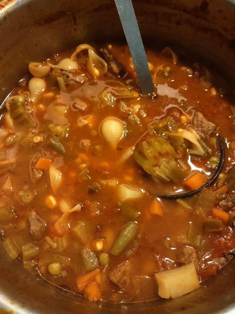 A pot of homemade vegetable beef soup. 