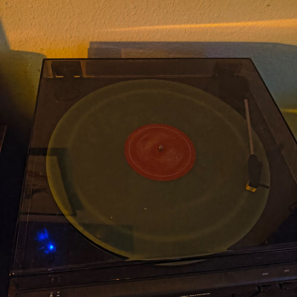 Green vinyl. Teal? Something. 
