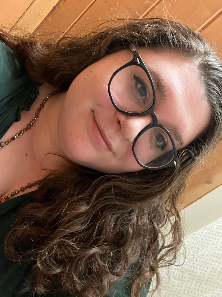 I’m smiling in this one. My hair is curly.