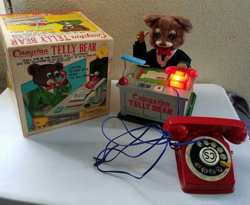 cragstan telly bear bear in a suit at a phone desk toy