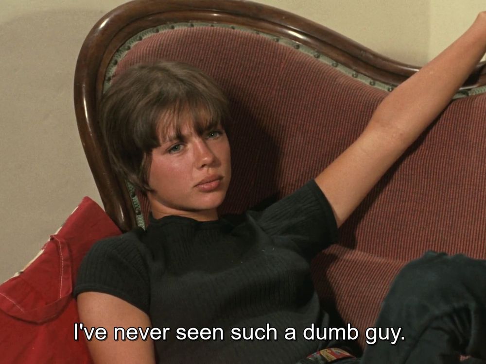 La Collectionneuse (1967)
dir: Eric Rohmer
Haydee Politiff lying on a couch subtitled 

I've never seen such a dumb guy 