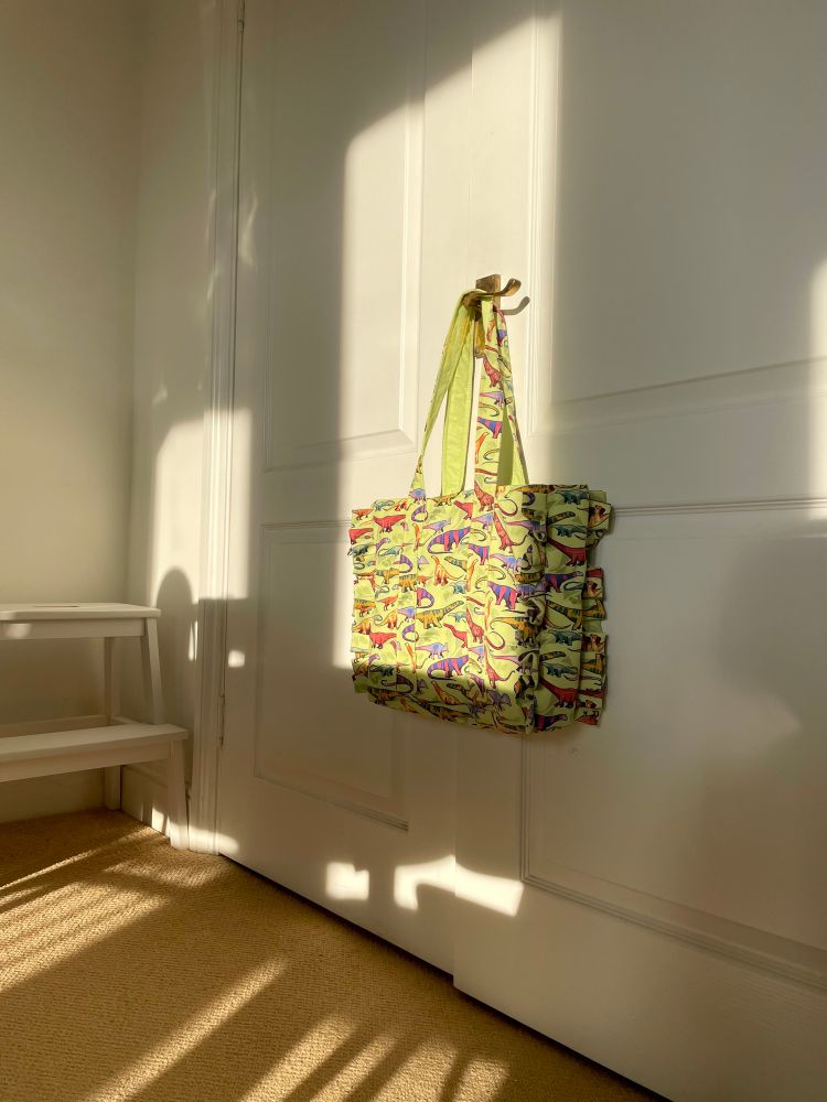 handmade + hand-designed dinosaur patterned green bag