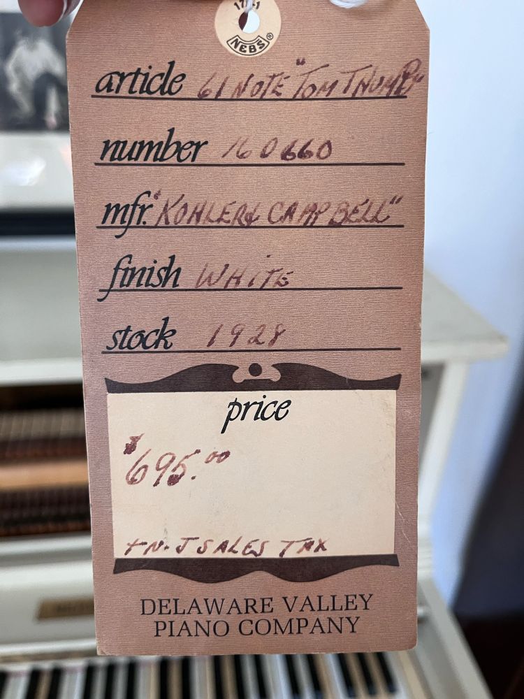 Original or resale tag for antique piano 