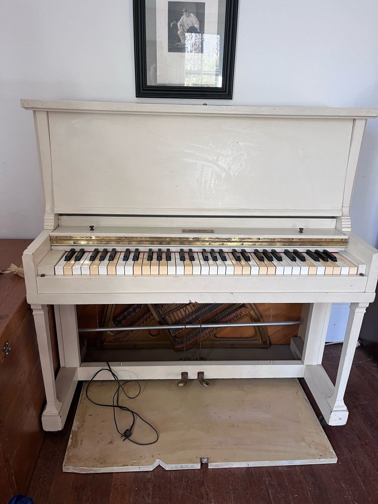 Small White piano with only 61 keys from 1928