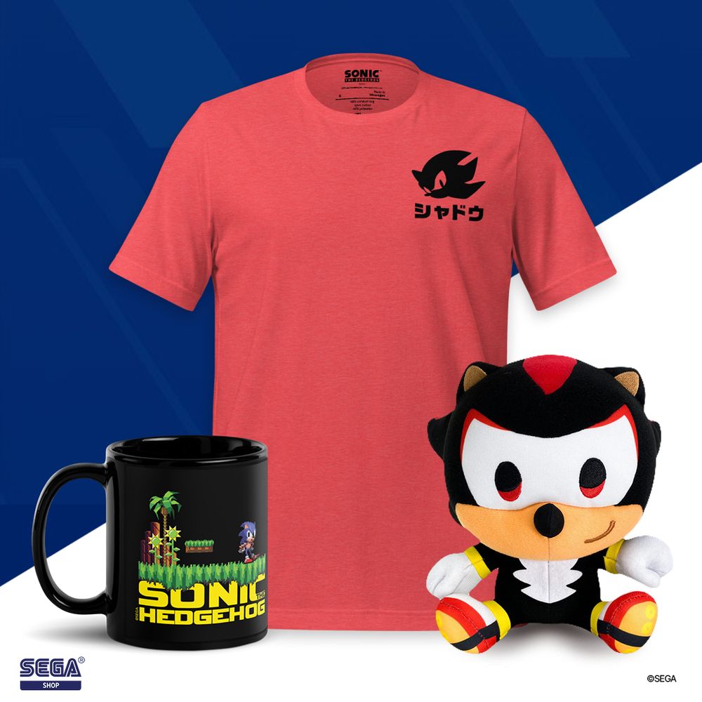 Black Sonic the Hedgehog mug. Red t-shirt with the words "Shadow" written in Katakana. Shadow the Hedgehog plush. 