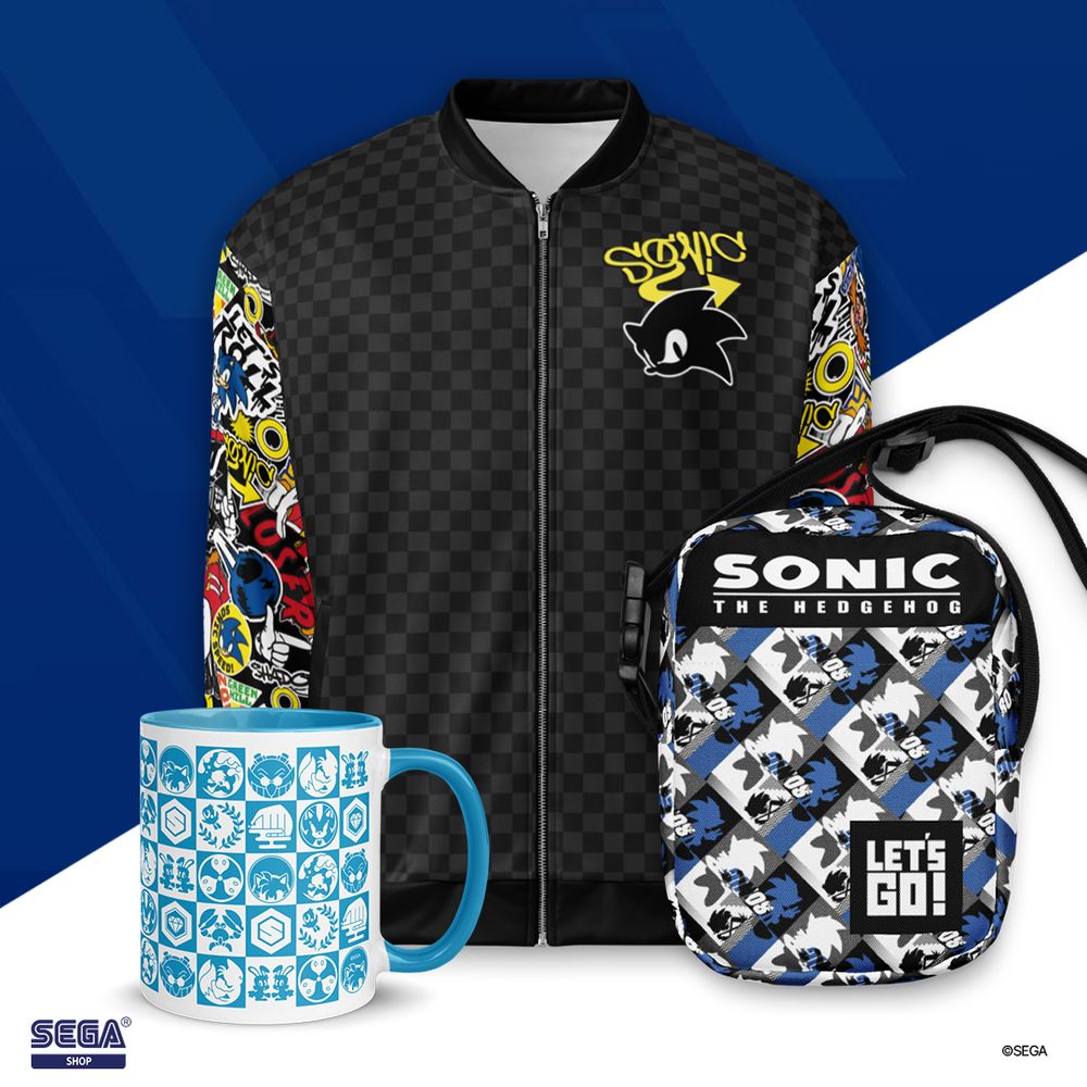 Blue mug featuring various icons/imagery from the Sonic series. Blue Sonic the Hedgehog backpack with the words, "Let's Go!" printed on it. Black checkered jacket with Sonic's silhouetted headshot and multicolored sleeves.