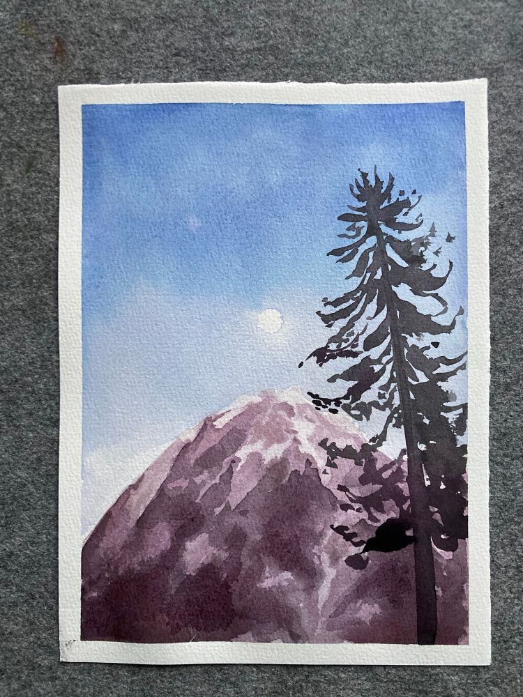 Watercolor picture of a mountain peak and a pine