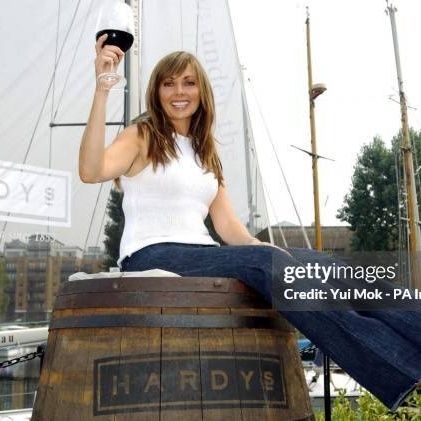 Carol Vorderman sitting on a barrel