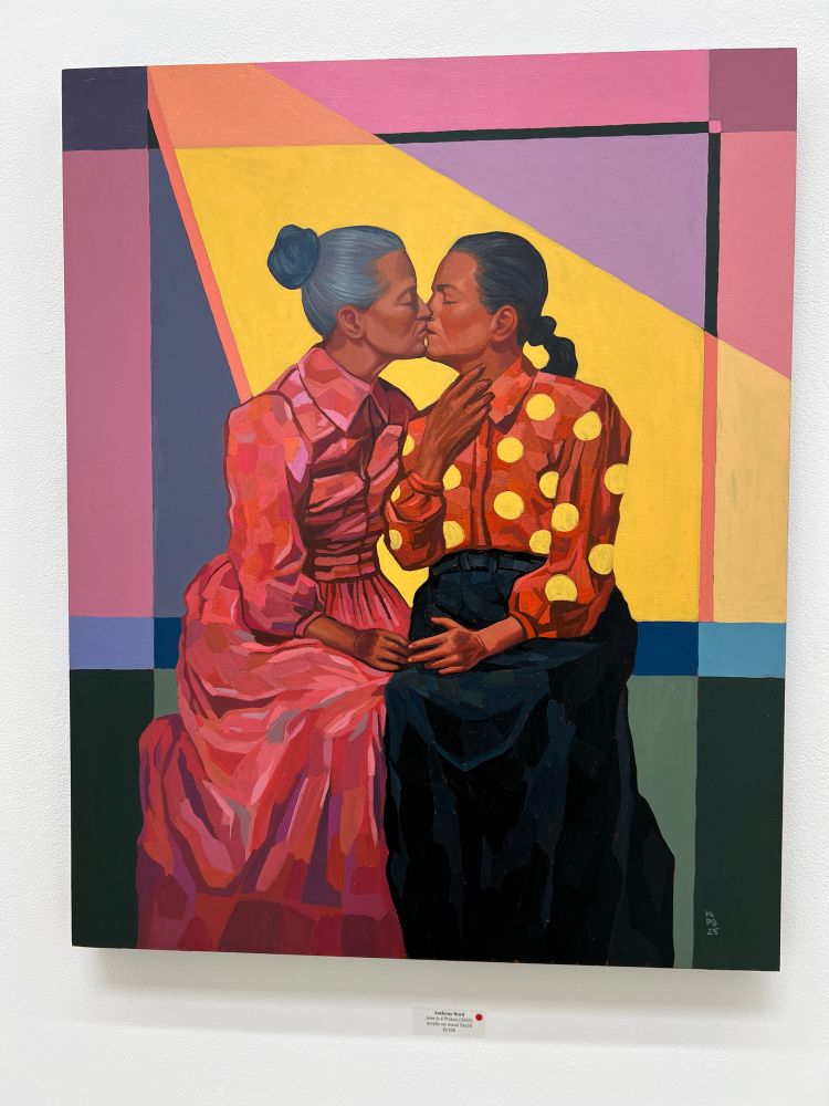 Two women kiss gently in an interior-like setting with vibrant, color-blocked geometry behind them. Their fashion (vintage-style dresses) and the composition’s symmetry feel ceremonial.
	•	Notes: This may be a re-centering of queer femme elders or matriarchs—interweaving desire, love, and cultural heritage.
	•	Lighting: The yellow triangle beams behind them almost function like a spotlight or divine blessing.