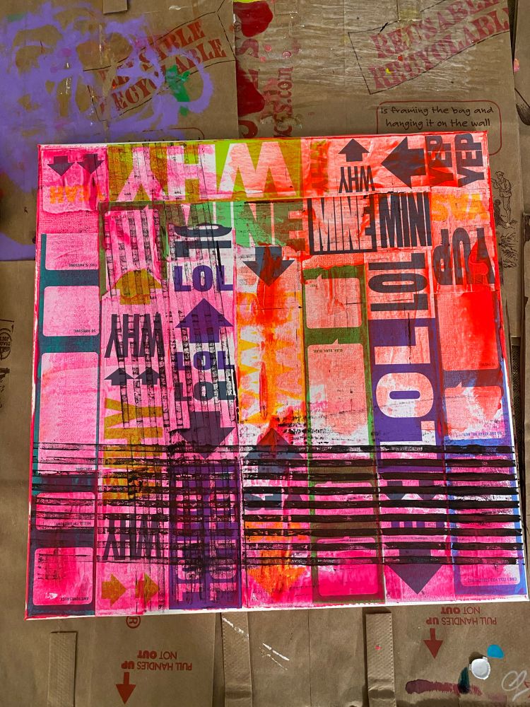 Square canvas covered with graphic collage and painted over