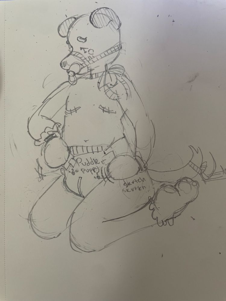 patches in mittens and socks pawing at the tapes of xyr diaper