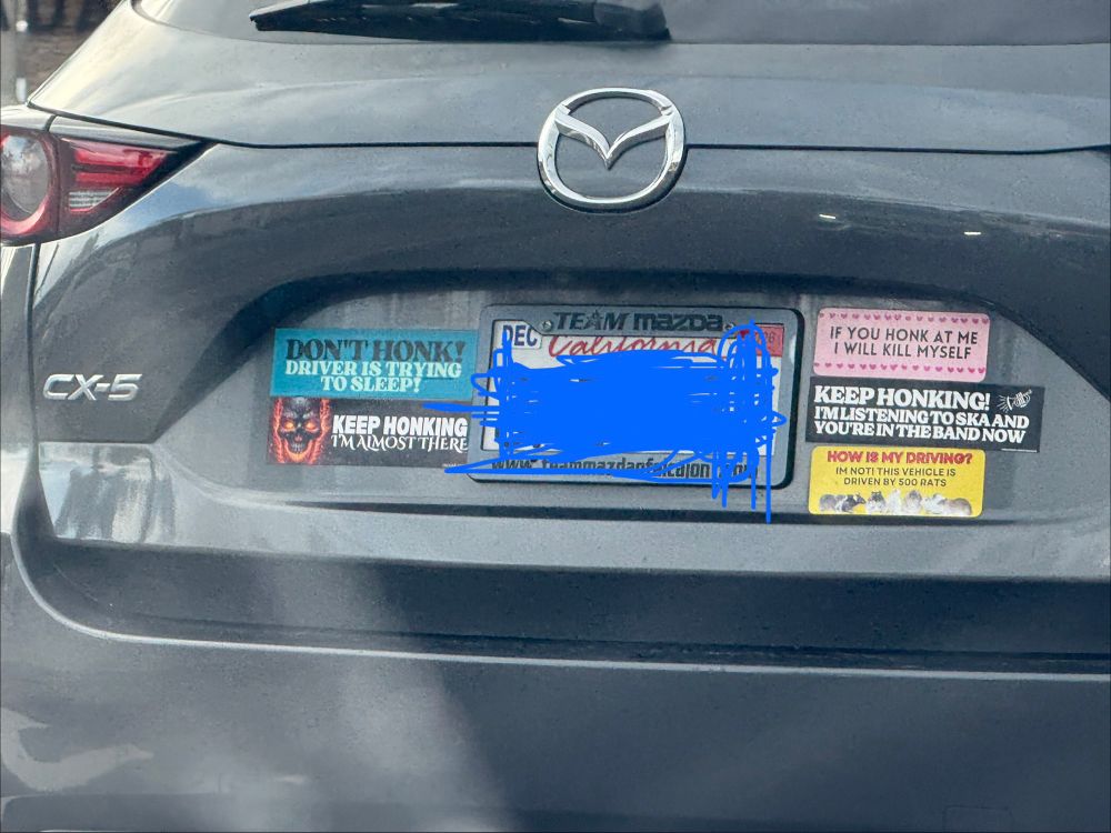 Mazda cx-5 covered in phenomenal bumper stickers 