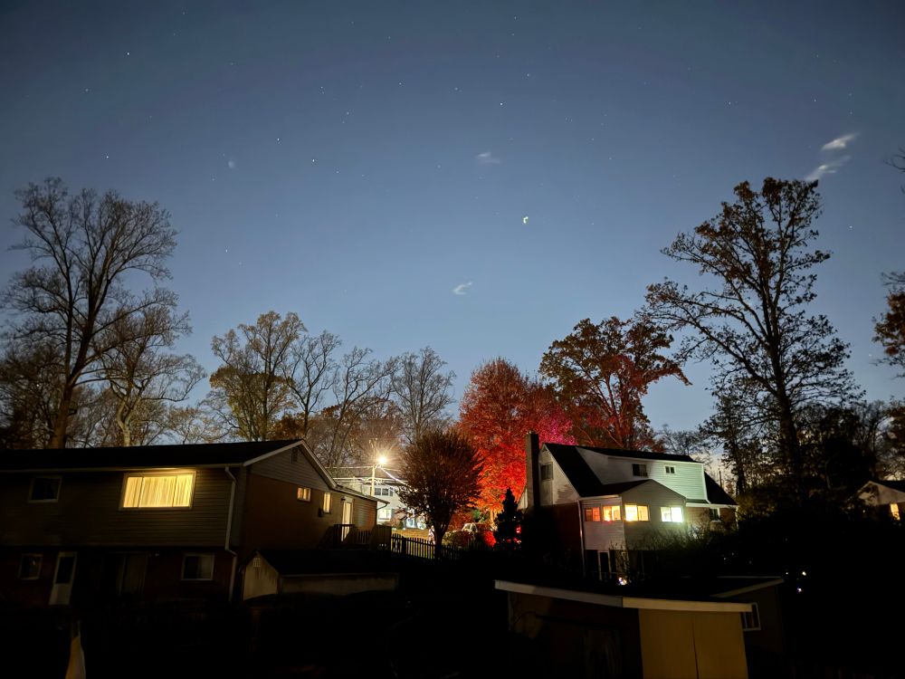 Evening view of the sky focused on Polaris taken from a suburban back yard. 