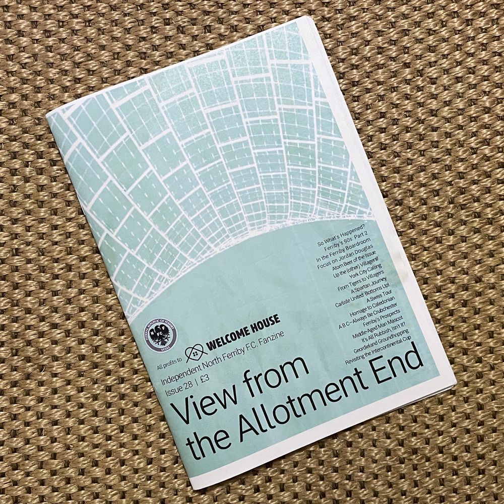 Cover of the mentioned issue on a brownish carpet.