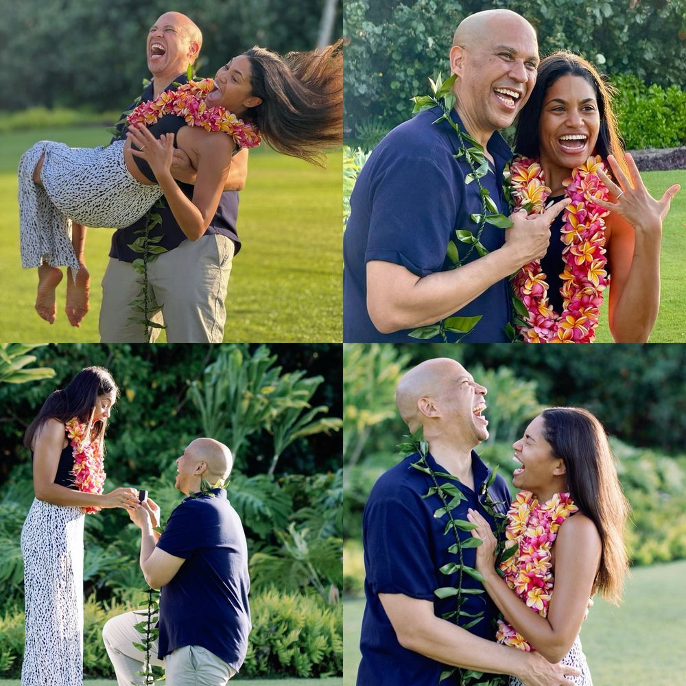 1. Cory Booker lifts Alexis Lewis joyfully in his arms on a grassy lawn, both laughing and wearing flower leis. 2. Cory Booker and Alexis Lewis smile widely, holding up her hand to show off her engagement ring, both draped in colorful leis. 3. Cory Booker kneels on one knee proposing to Alexis Lewis, who looks down in surprise and delight, surrounded by lush greenery. 4. Cory Booker and Alexis Lewis laugh together, gazing at each other closely, wearing leis and standing outdoors in a garden setting.