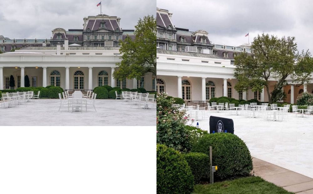 
Side-by-side photos of the newly redesigned White House Rose Garden, both taken from similar angles showing the colonnade and the Eisenhower Executive Office Building in the background.
The garden area in both photos has been resurfaced with a pale stone or concrete material, replacing the traditional grass. White metal tables and chairs are spread across the open space. The left image shows a more symmetrical view of the colonnade, while the right image includes more of the surrounding landscaping in the foreground, including neatly trimmed hedges and flowering bushes. A small setup in the right foreground displays items draped with a presidential seal, likely for an upcoming event or press setup. The sky is overcast in both images.