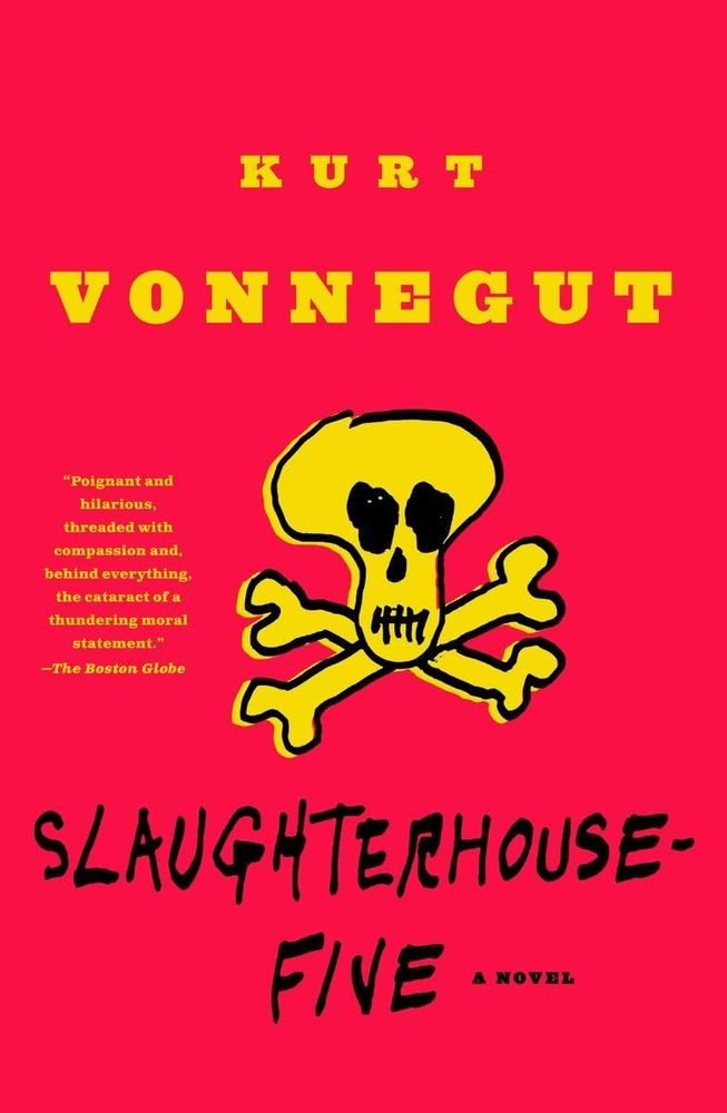 A book cover image of the book "Slaughterhouse Five" by Kurt Vonnegut. The cover is bright red with a yellow skull and crossbones in the center. 