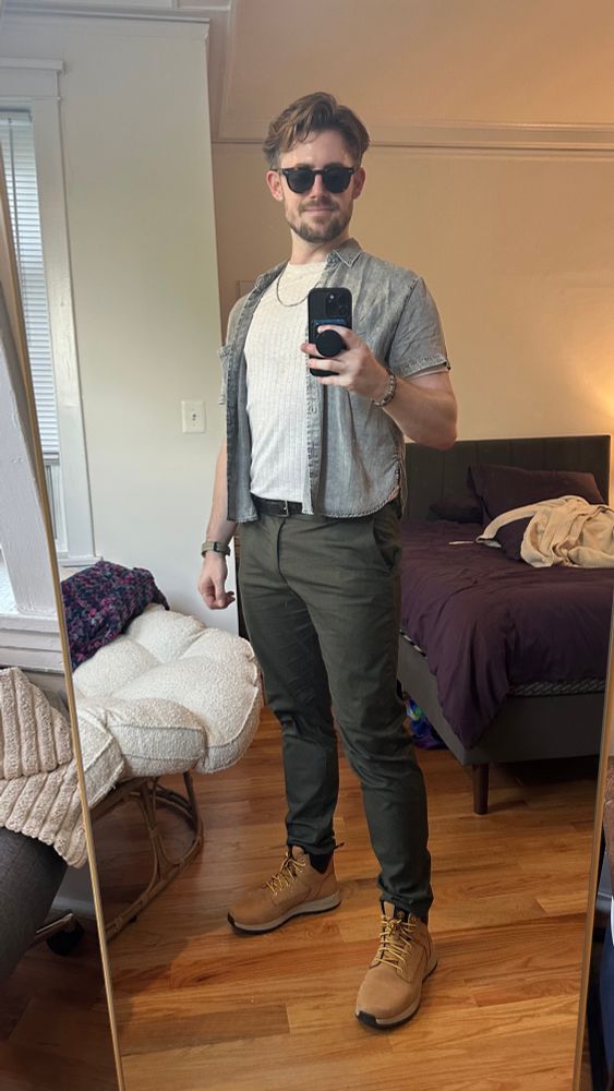 mirror selfie showing me wearing sunglasses, grey and white shirts, over green pants with khaki shoes