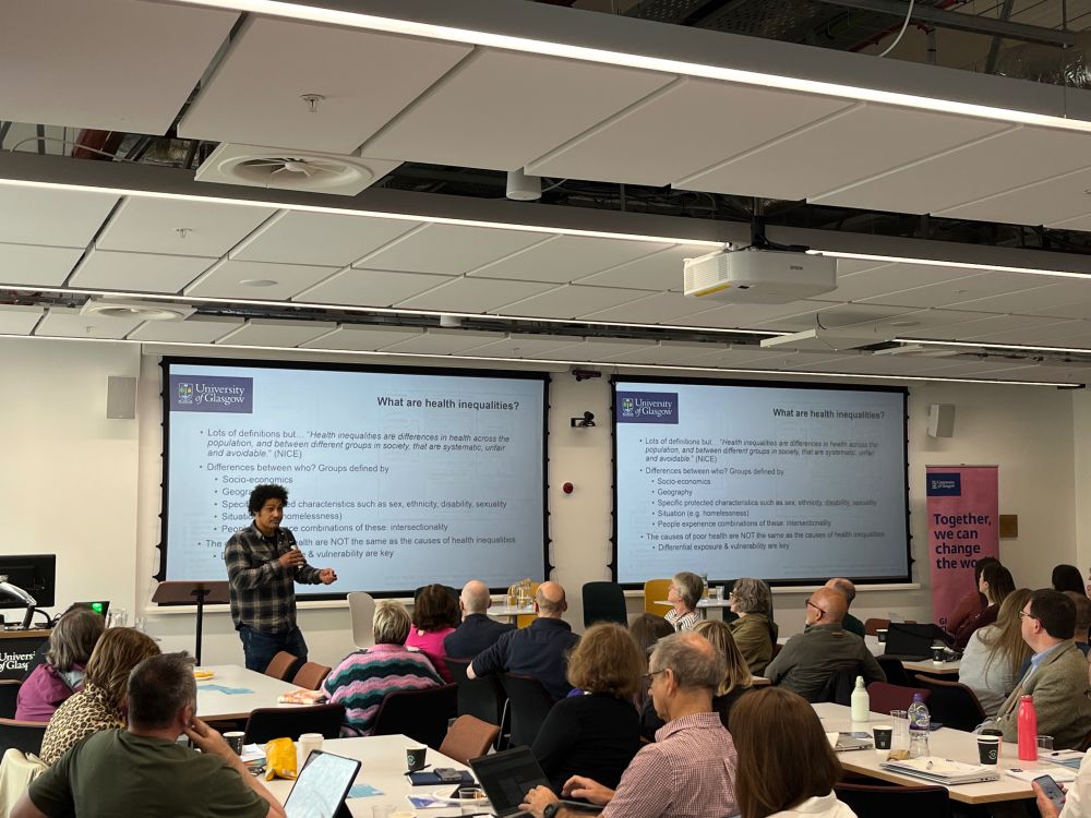 A photo of Professor Jason Gill delivering his talk