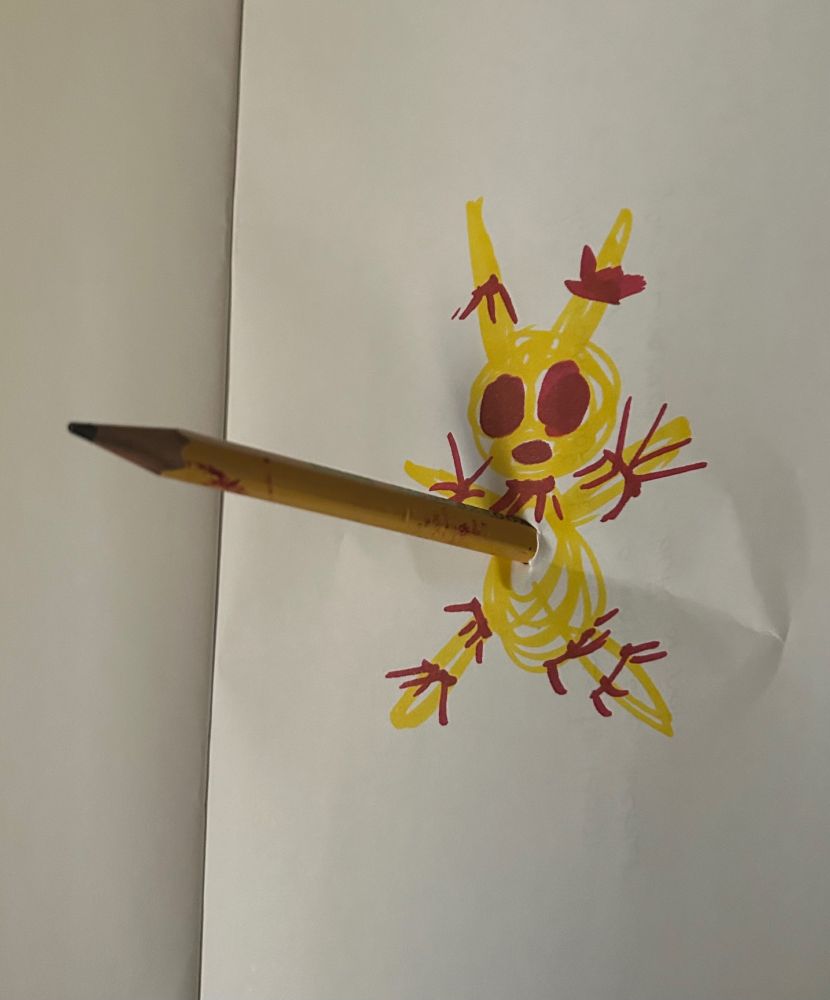 Spring Bonnie springlocks William inside the suit.

The Artist decided to put a pencil through the drawing’s chest/stomach.