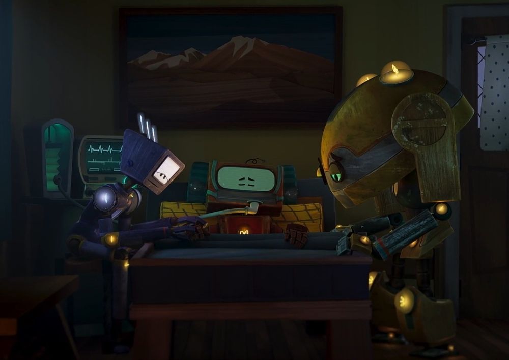 A Still from the short film "LUKi And The Lights" Featuring LUKi on a deathbed with his robot friends saddened by the sight of him nearly dead because of ALS. Yes, that's the real plot.
