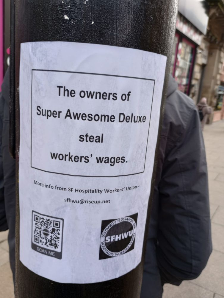 Poster on lamp post
Text: 'The owners of Super Awesome Deluxe steal workers' wages - contact SF Hospitality Workers' Union sfhwu@riseup.net'