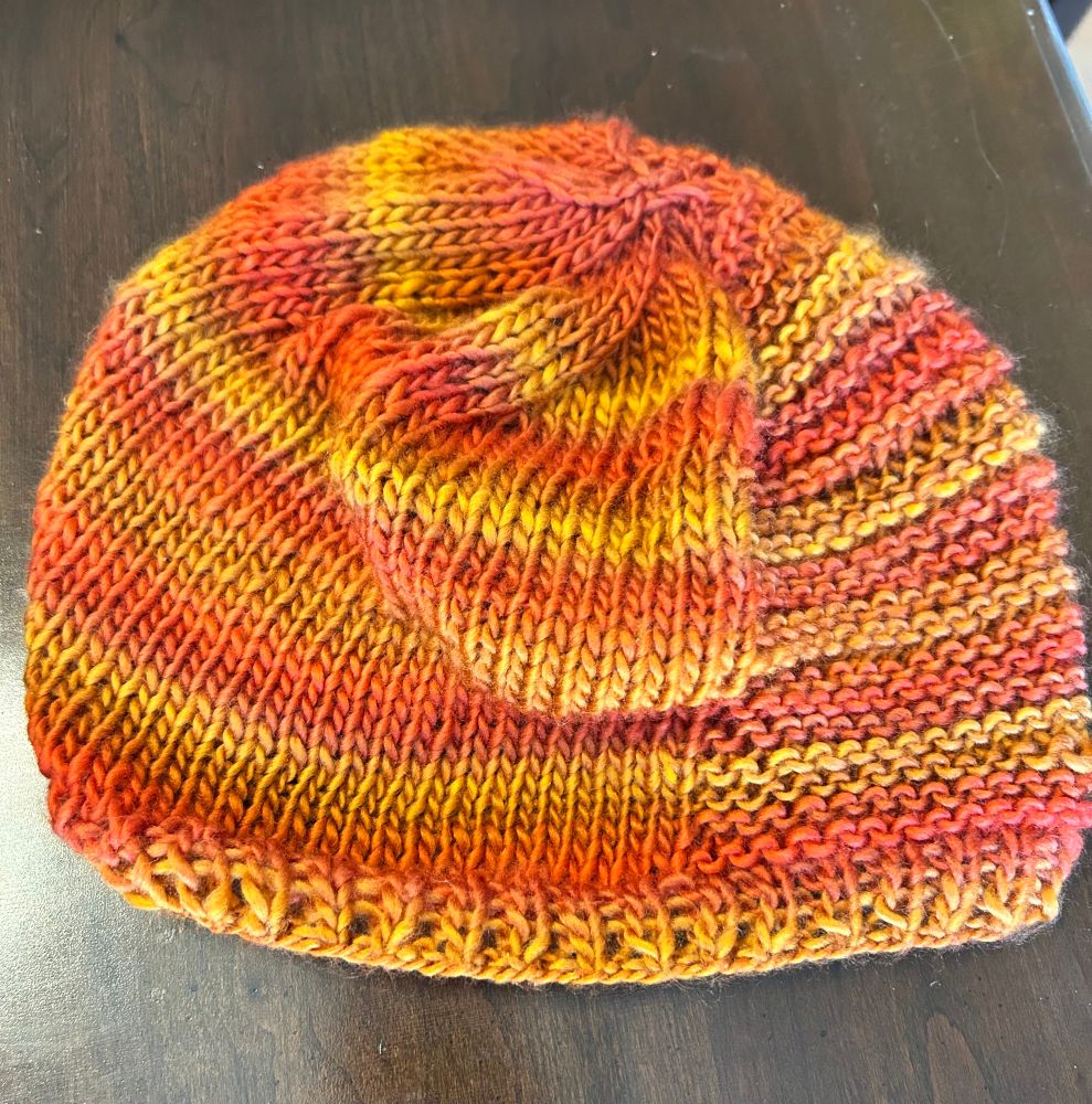 An orange striped knitted hat
